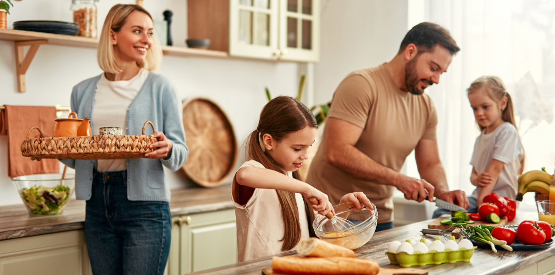 Image of a family cooking together