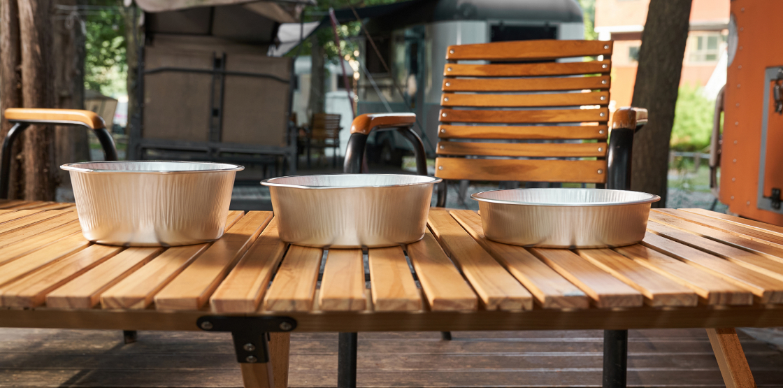 Camping table with dishes